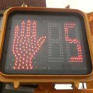 Walk, don't walk sign with countdown clock